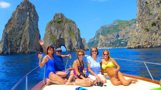 Taking a private boat around the Amalfi Coast, Italy. Stopping for scenic views and delicious food.